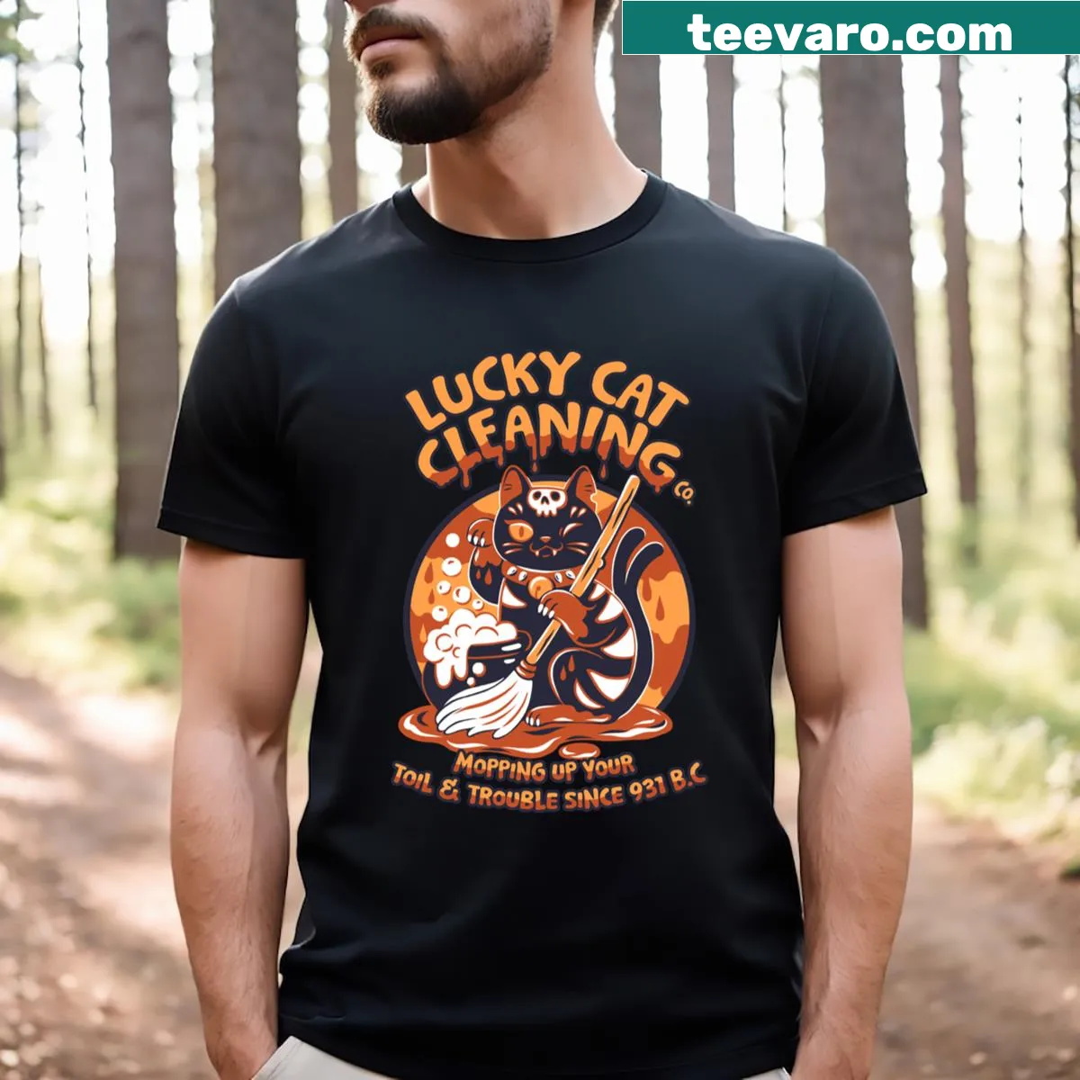 Funny Halloween cat dressed as a witch graphic — on a men's t-shirt