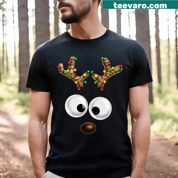 Kids Christmas T-shirt featuring a cute reindeer face illustration