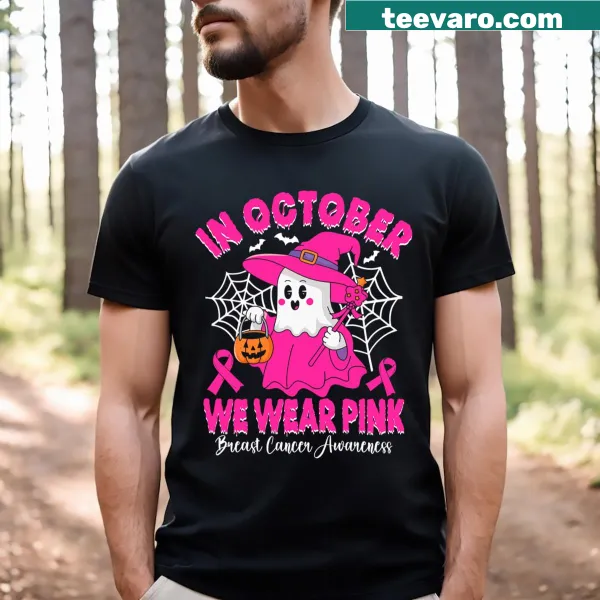 T-shirt with the phrase 'In October We Wear Pink' for Halloween and awareness.