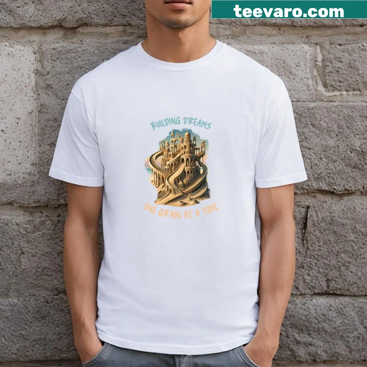 Illustrative t-shirt with sand sculpting theme and motivational text — on a men's t-shirt