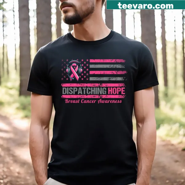 T-shirt with a pink ribbon and American flag design for breast cancer awareness.