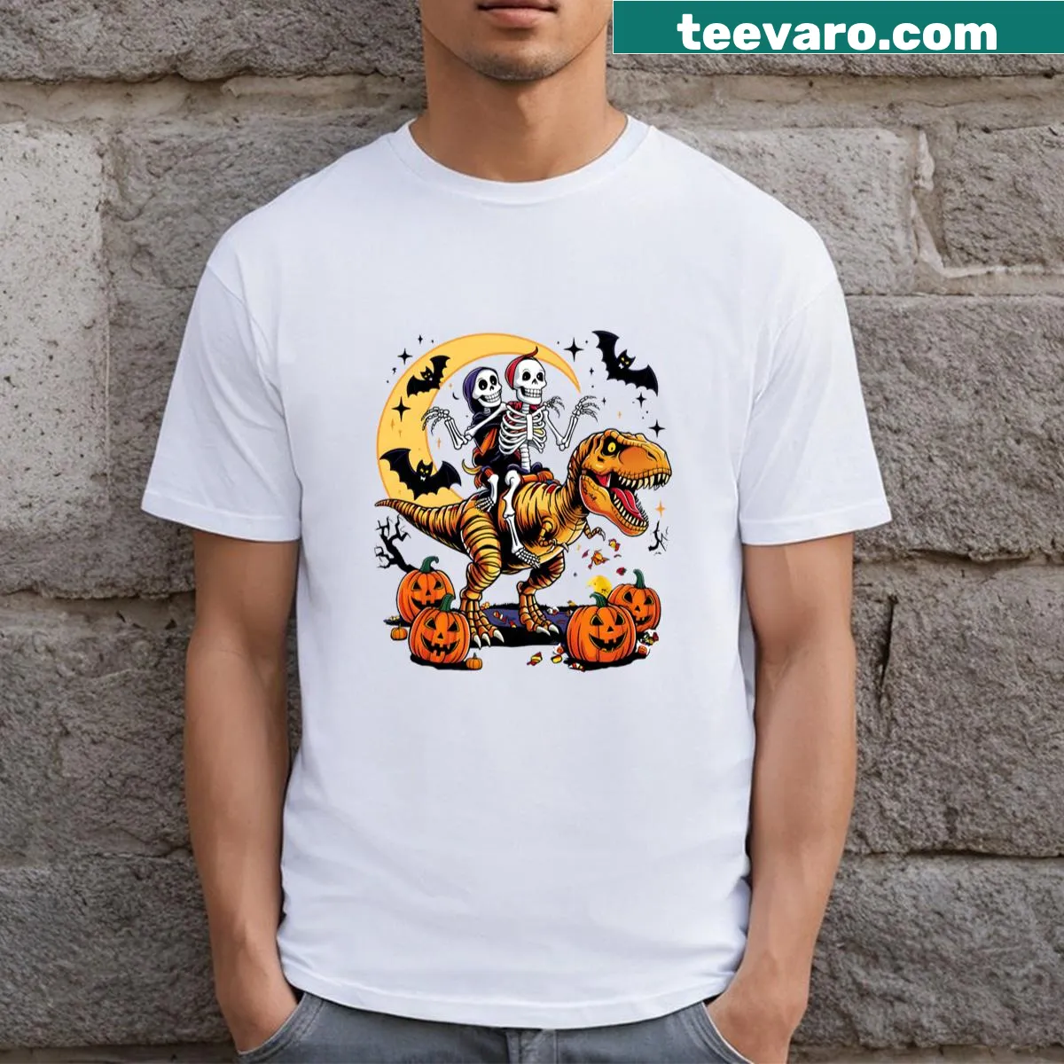 Cartoon Halloween-themed dinosaur graphic T-shirt for kids with mummy and zombie designs — on a men's t-shirt