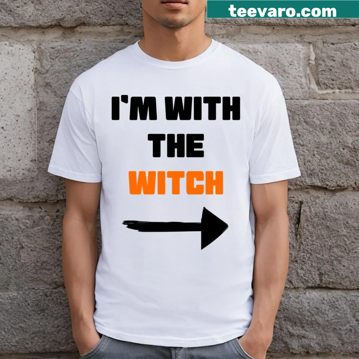 Halloween t-shirt with 'I'm With The Witch' funny graphic — on a men's t-shirt