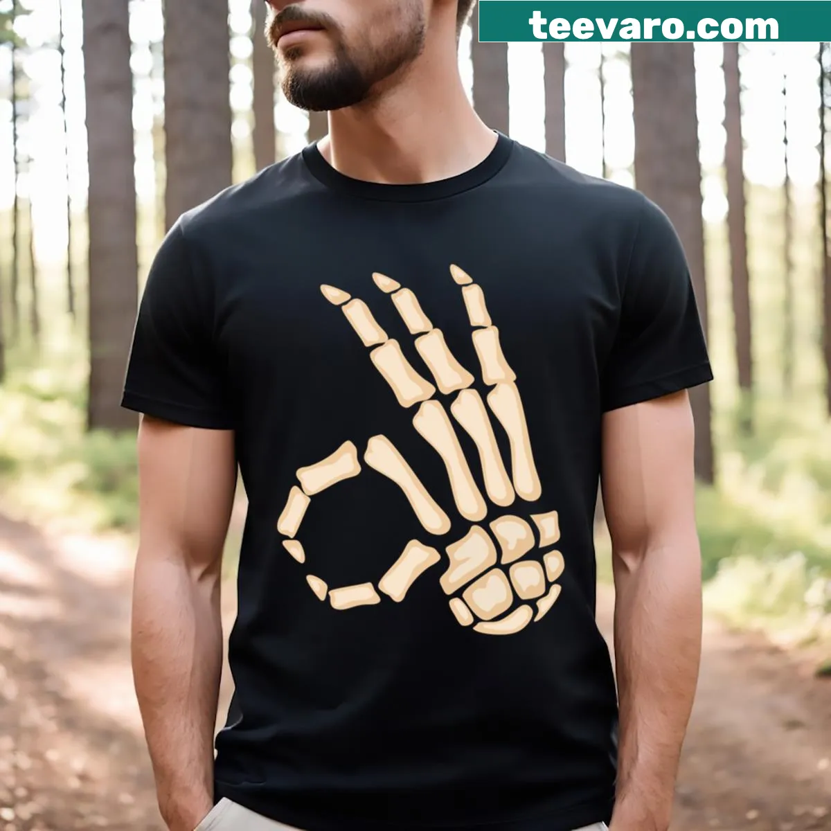 Skeleton hand graphic T-shirt for Halloween fun — on a men's t-shirt