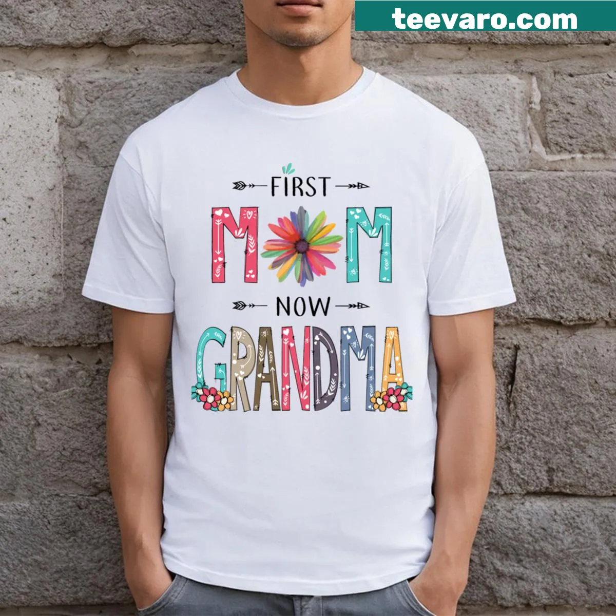 Wildflower graphic on a shirt with text 'First Mom Now Grandma' — on a men's t-shirt