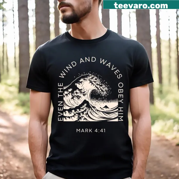 Christian t-shirt with the phrase 'Even The Wind And The Waves Obey Him' in bold text