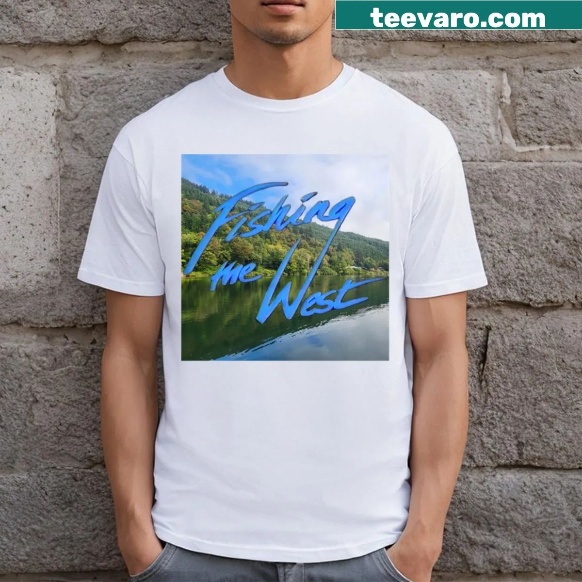 Fishing-themed t-shirt with an angler graphic against mountains and water — on a men's t-shirt