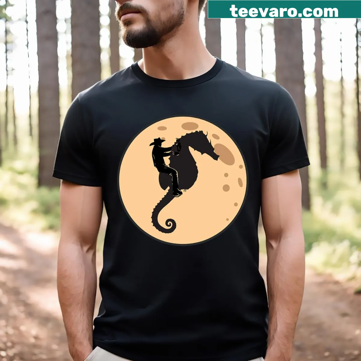 Whimsical illustration of a cowboy riding a seahorse against a moon. — on a men's t-shirt