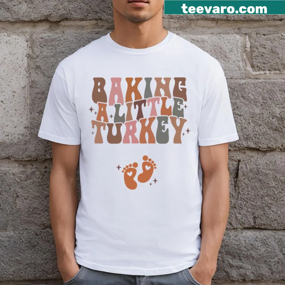 Thanksgiving pregnancy announcement t-shirt with turkey baking graphic — on a men's t-shirt