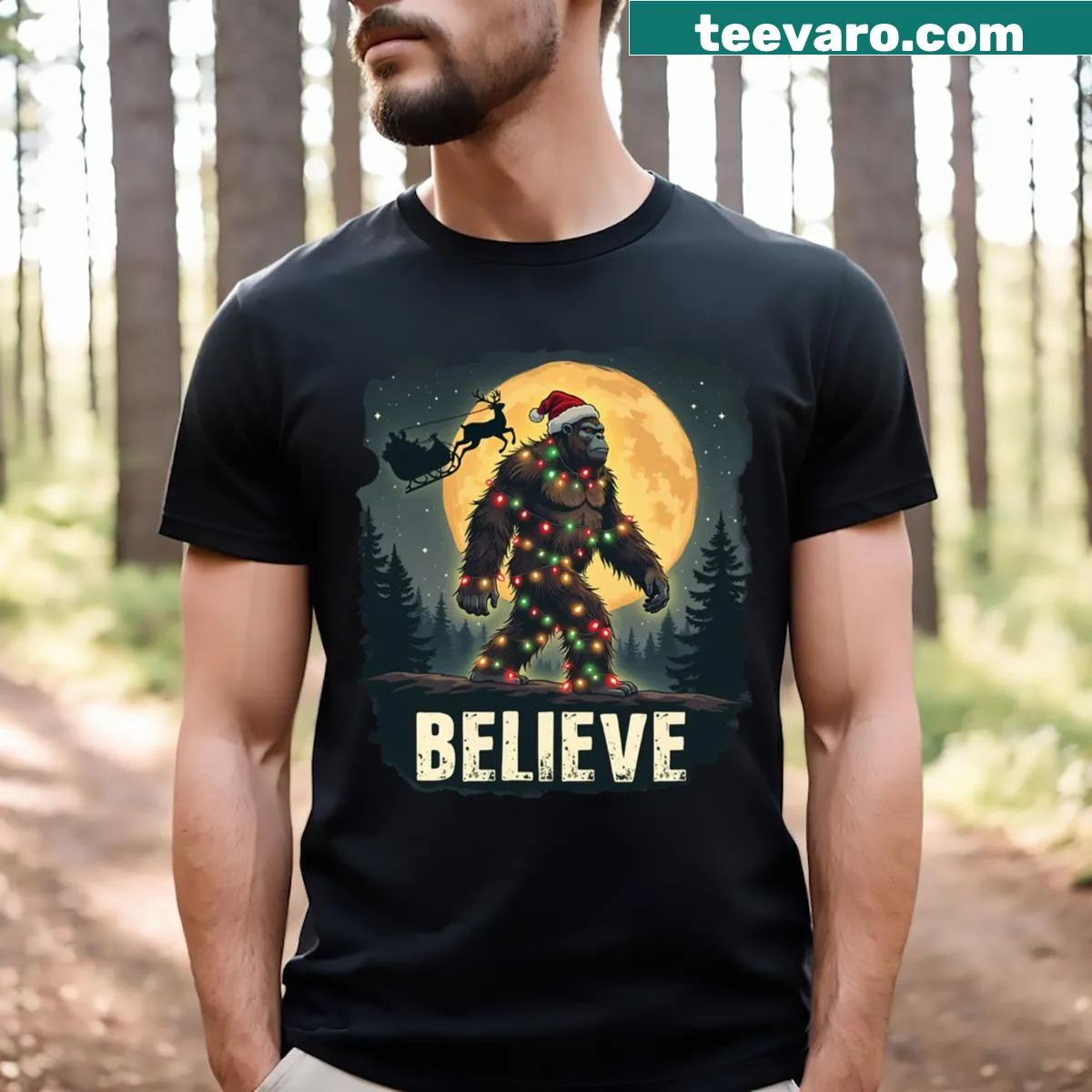Christmas t-shirt featuring Bigfoot wearing a Santa hat. — on a men's t-shirt
