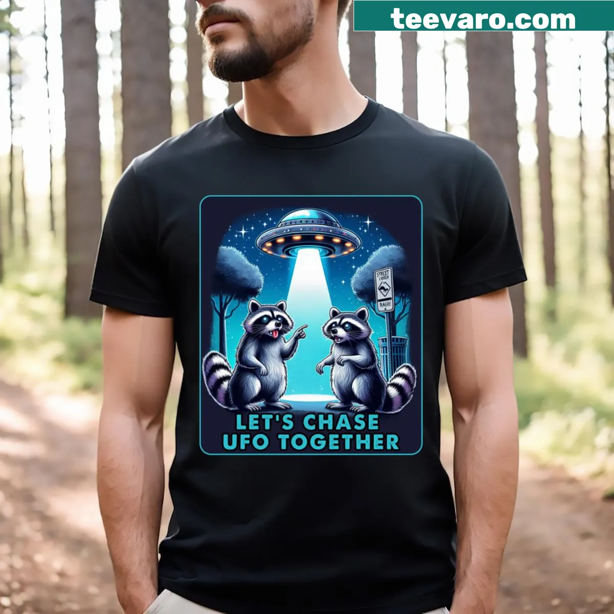 Funny T-shirt featuring raccoons with a UFO in a whimsical design — on a men's t-shirt