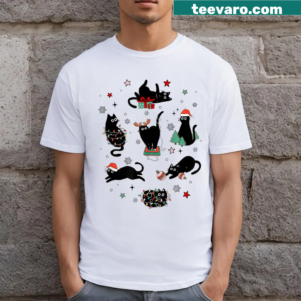 Illustration of black cats with Christmas ornaments and snowflakes — on a men's t-shirt