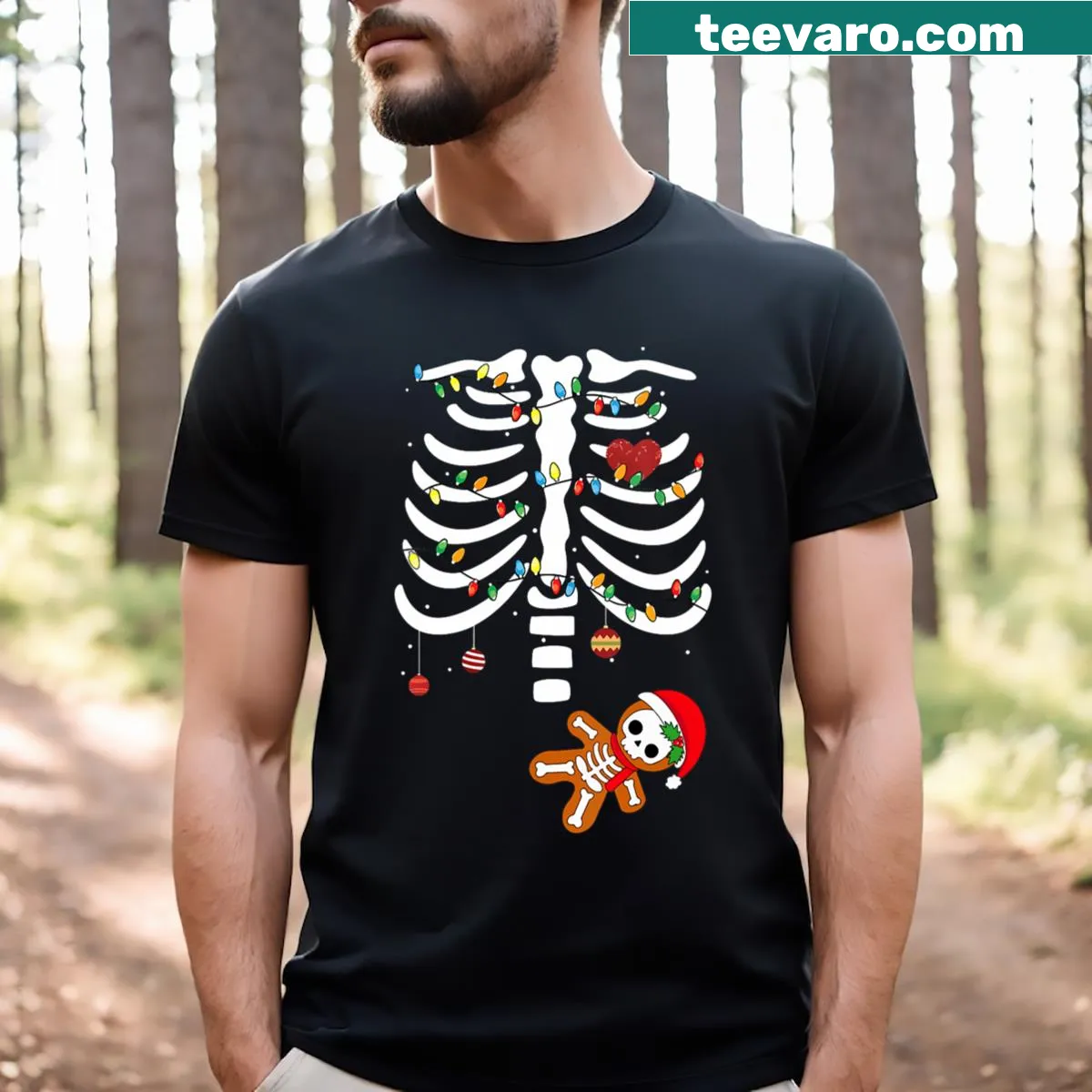 Whimsical skeleton design with 'Merry and Pregnant' text on a V-neck T-shirt — on a men's t-shirt