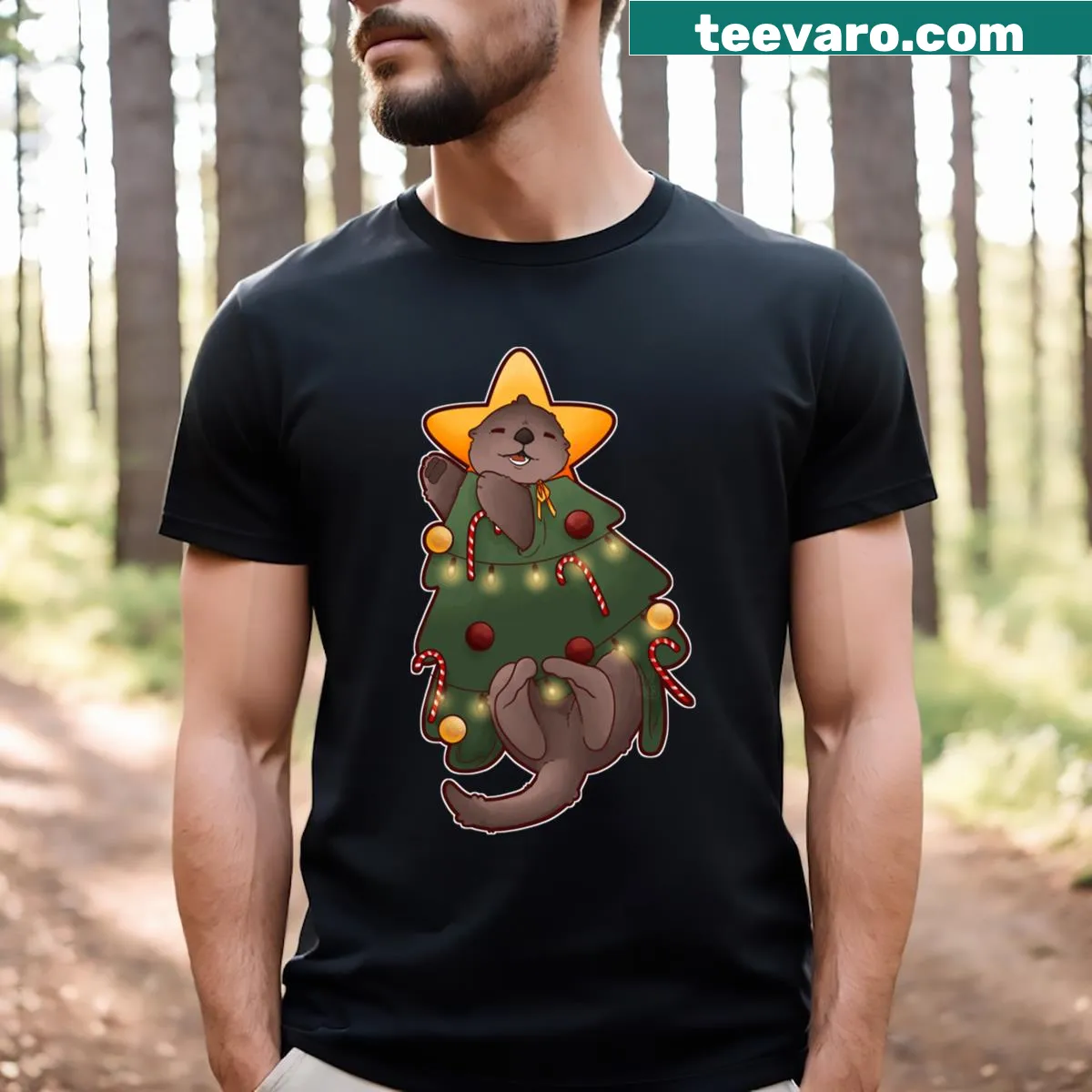 Cute otter with Christmas tree design T-shirt — on a men's t-shirt