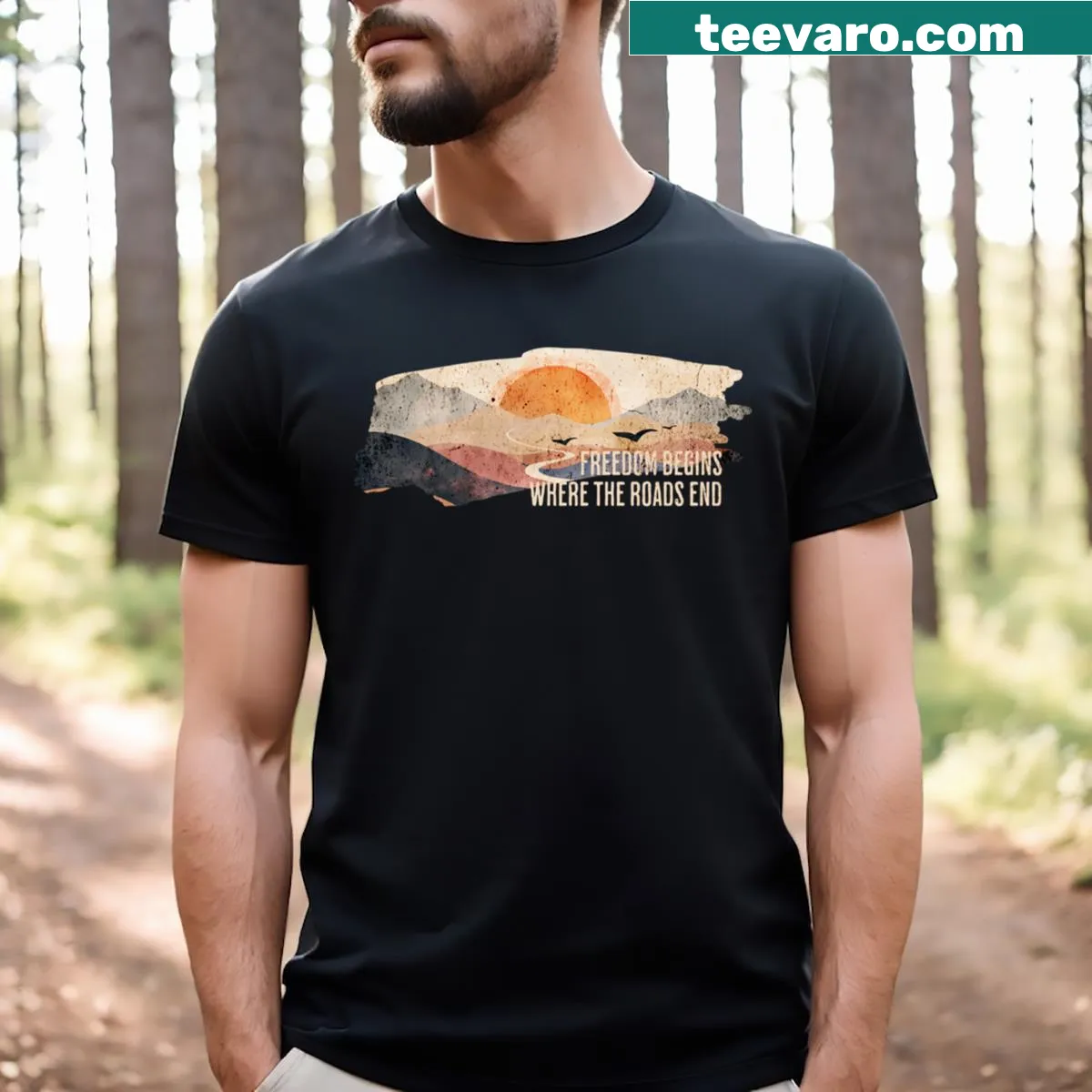 Inspirational quote graphic saying 'Freedom Begins Where The Roads End' on a T-shirt. — on a men's t-shirt