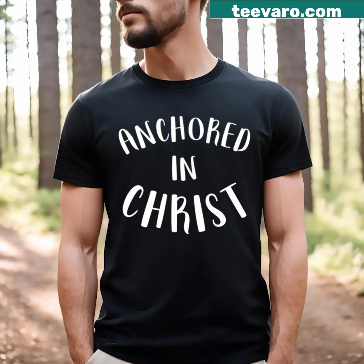 Inspirational Christian T-shirt with 'Anchored In Christ' text. — on a men's t-shirt