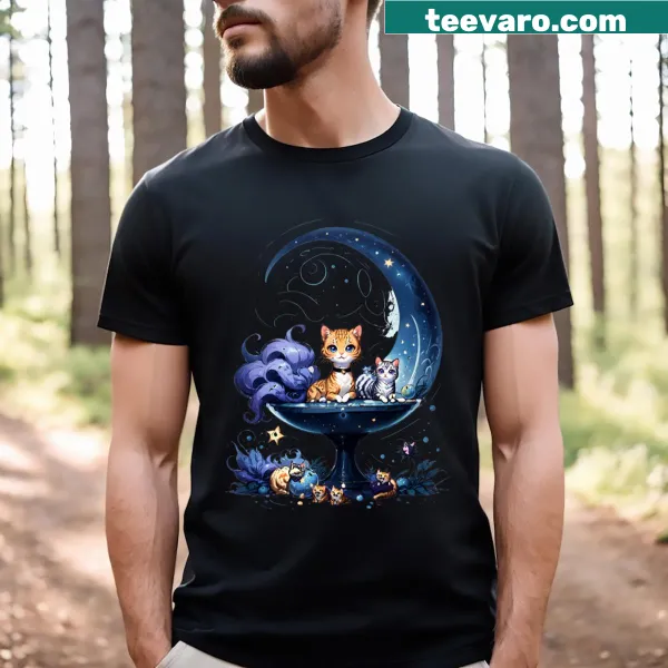 Illustration of a cat sitting on a crescent moon on a t-shirt.