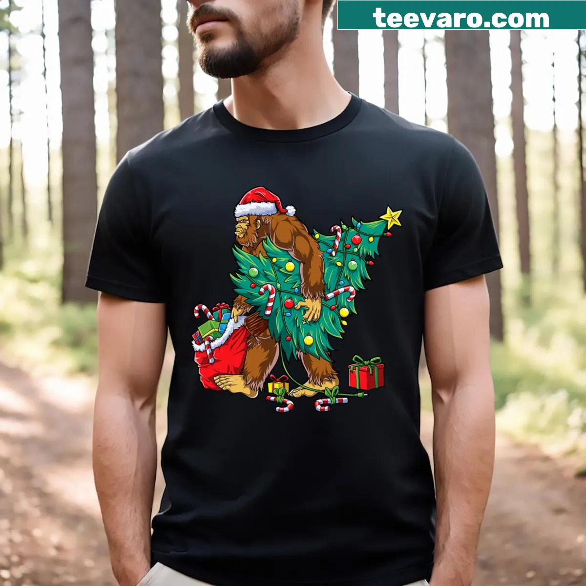 Bigfoot Christmas T-shirt featuring Sasquatch with tree lights — on a men's t-shirt