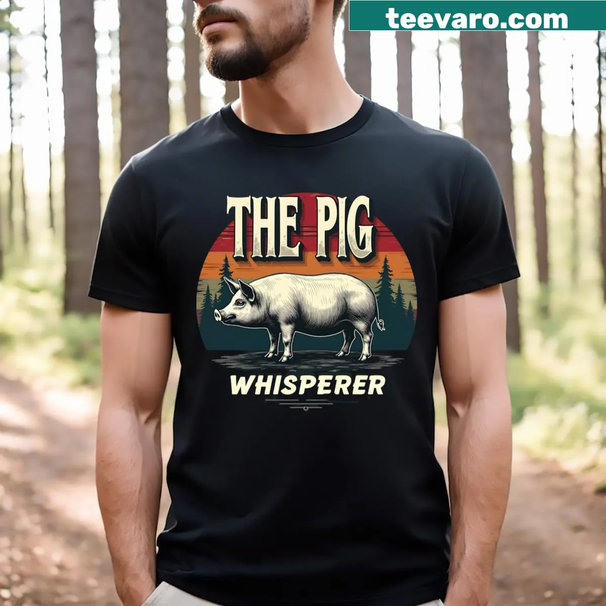 T-shirt featuring bold text 'The Pig Whisperer' — on a men's t-shirt