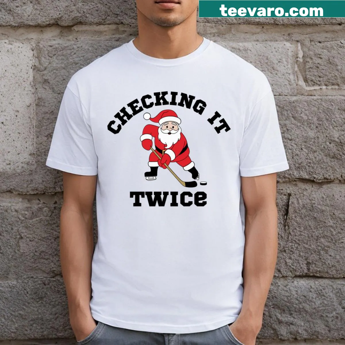Santa playing ice hockey graphic T-shirt — on a men's t-shirt