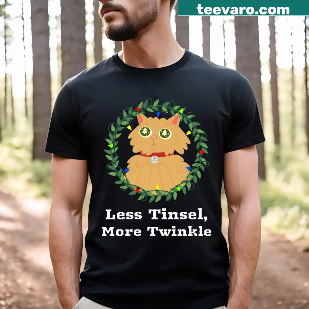 Playful Less Tinsel More Twinkle text on a festive T-shirt — on a men's t-shirt