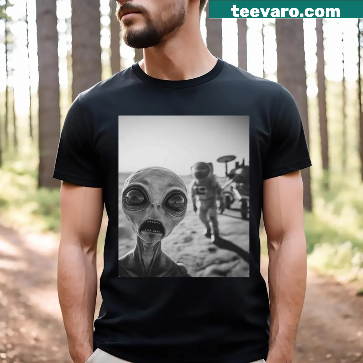 Cartoon graphic of an alien spaceship causing a playful chaos — on a men's t-shirt