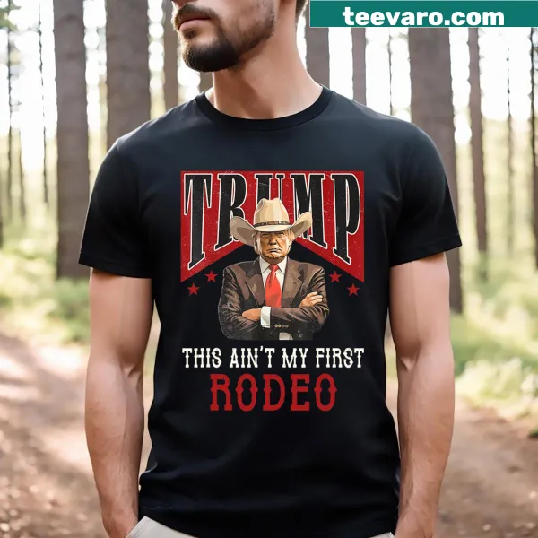 Funny T-shirt with cowboy theme and 'Ain't My First Rodeo' text