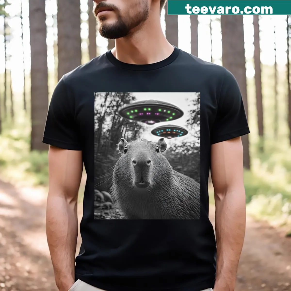 Capybara and alien UFO cartoon graphic kids t-shirt — on a men's t-shirt