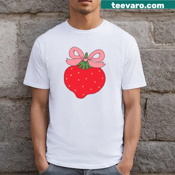 Cute t-shirt featuring an adorable strawberry with a bow graphic