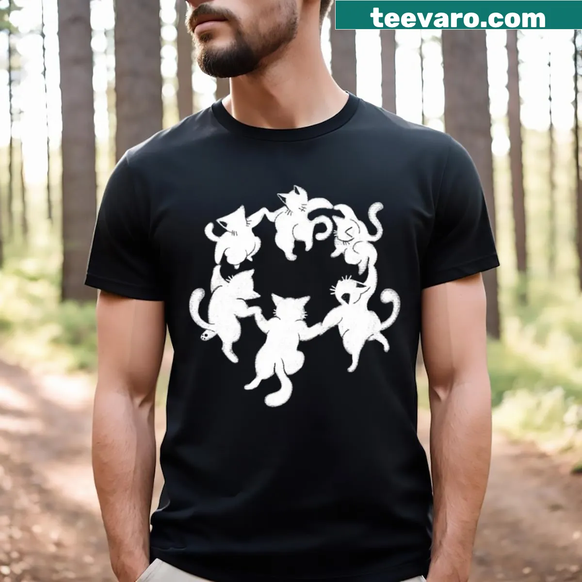 Playful dancing cats in a whimsical circle on an inverted t-shirt — on a men's t-shirt