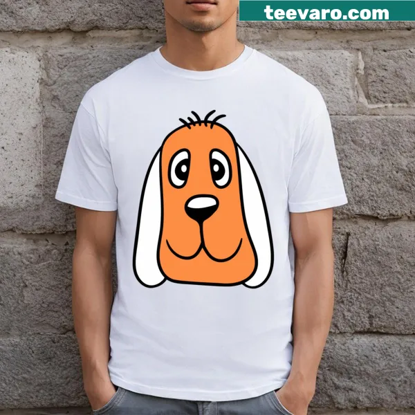 Cute cartoon T-shirt featuring a happy dog's face illustration.