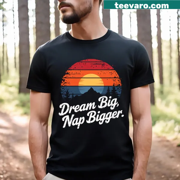 T-shirt with playful text 'Dream Big Nap Bigger' for relaxed wear