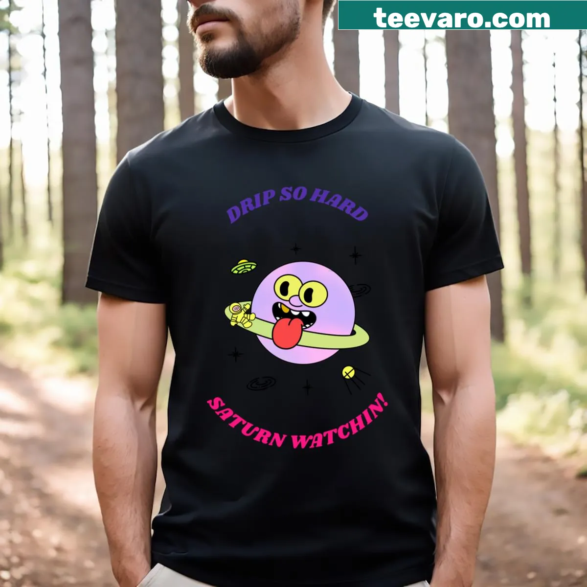 Playful Saturn graphic T-shirt — on a men's t-shirt