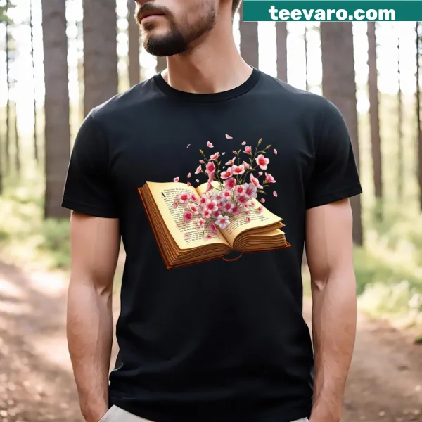 Illustration of flowers growing from an open book on T-shirt