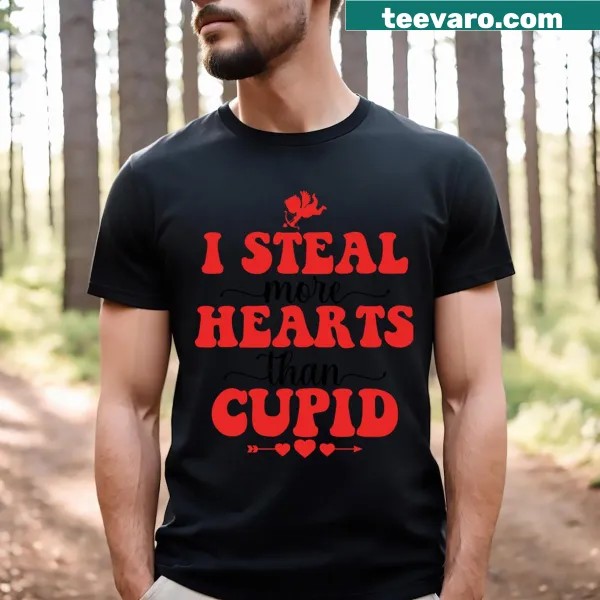 Fun t-shirt with the phrase 'I Steal More Hearts Than Cupid' in playful text