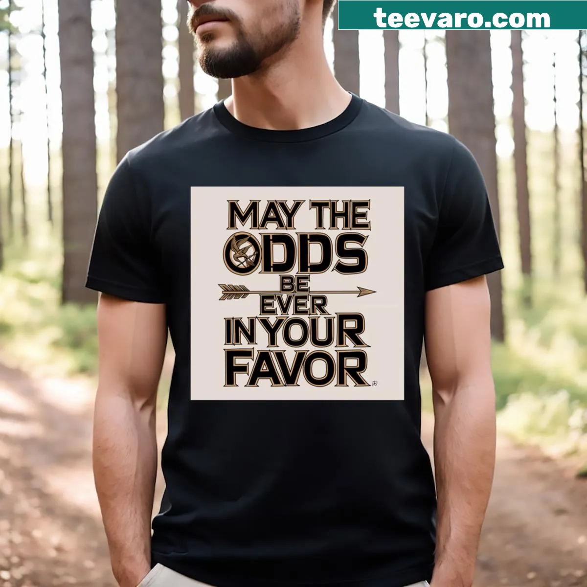 Hunger Games themed T-shirt with 'May The Odds Be Ever In Your Favor' text — on a men's t-shirt