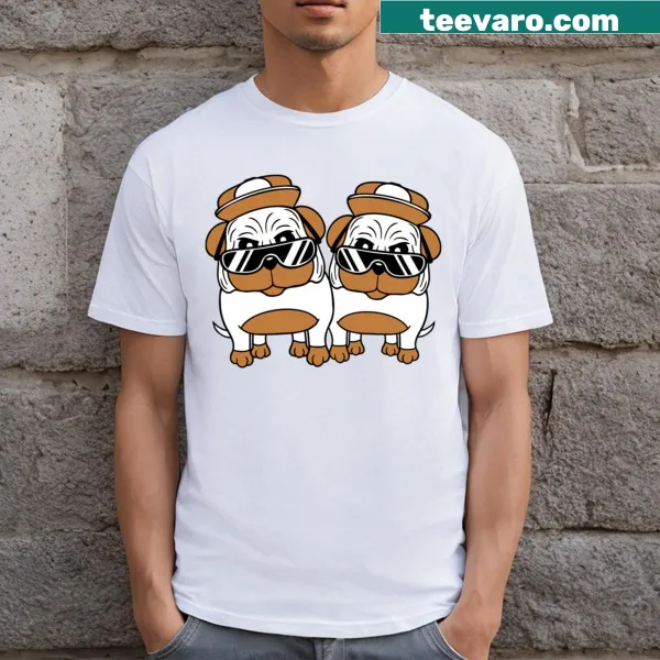 Cartoon T-shirt featuring two dogs in sunglasses and a cap