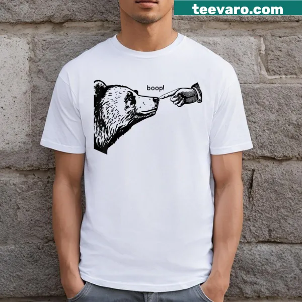 Cute T-shirt featuring a cartoon bear inviting a boop with a friendly expression.
