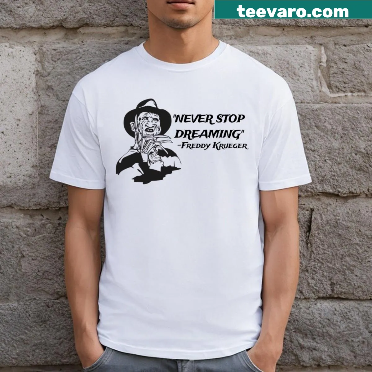 Illustrative T-shirt featuring Freddy Krueger with 'Never Stop Dreaming' text — on a men's t-shirt