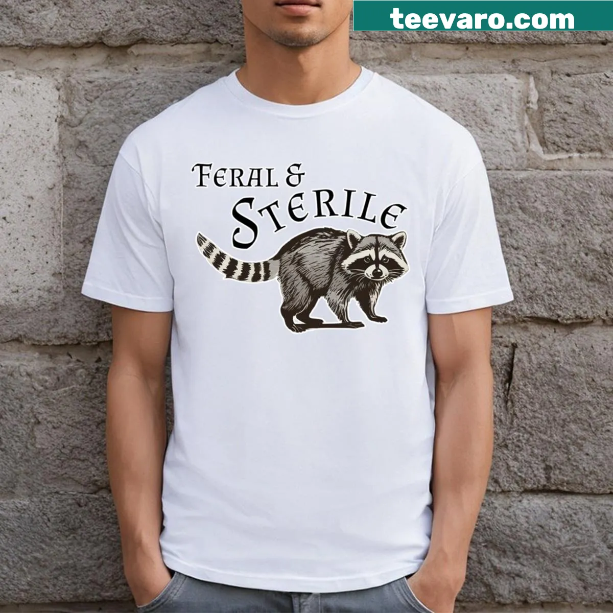 Whimsical t-shirt with raccoon illustration and 'Feral And Sterile' text — on a men's t-shirt