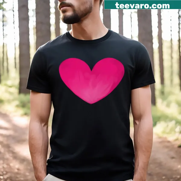 T-shirt featuring a soft pink heart on a black background.