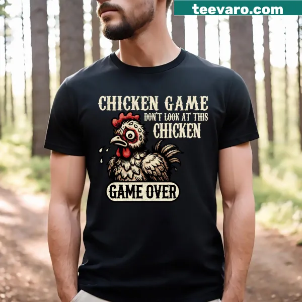 Funny T-shirt showing a panicked cartoon chicken with text.