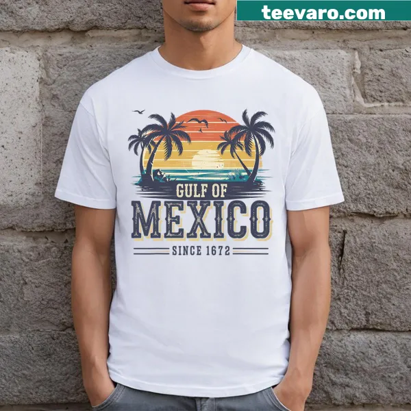 Tropical sunset t-shirt featuring a beach scene and retro style