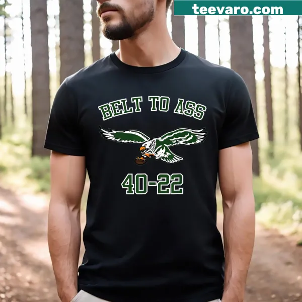 Humorous t-shirt featuring the phrase 'Belt To Ass 40 22 Winner'