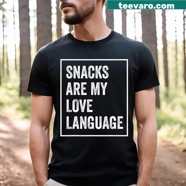 Funny typography design stating 'Snacks Are My Love Language' on a T-shirt.