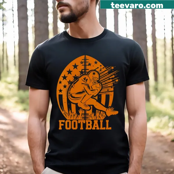 V-neck T-shirt featuring a football graphic for game day enthusiasm.
