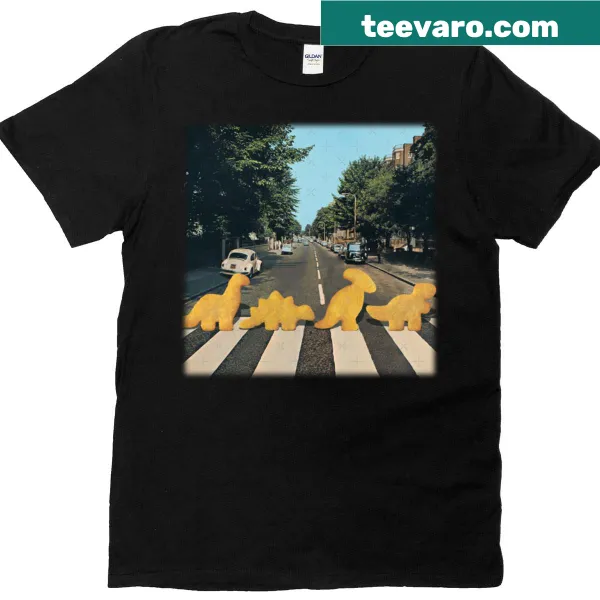 Cartoon dinosaur characters eating chicken nuggets on a fun T-shirt