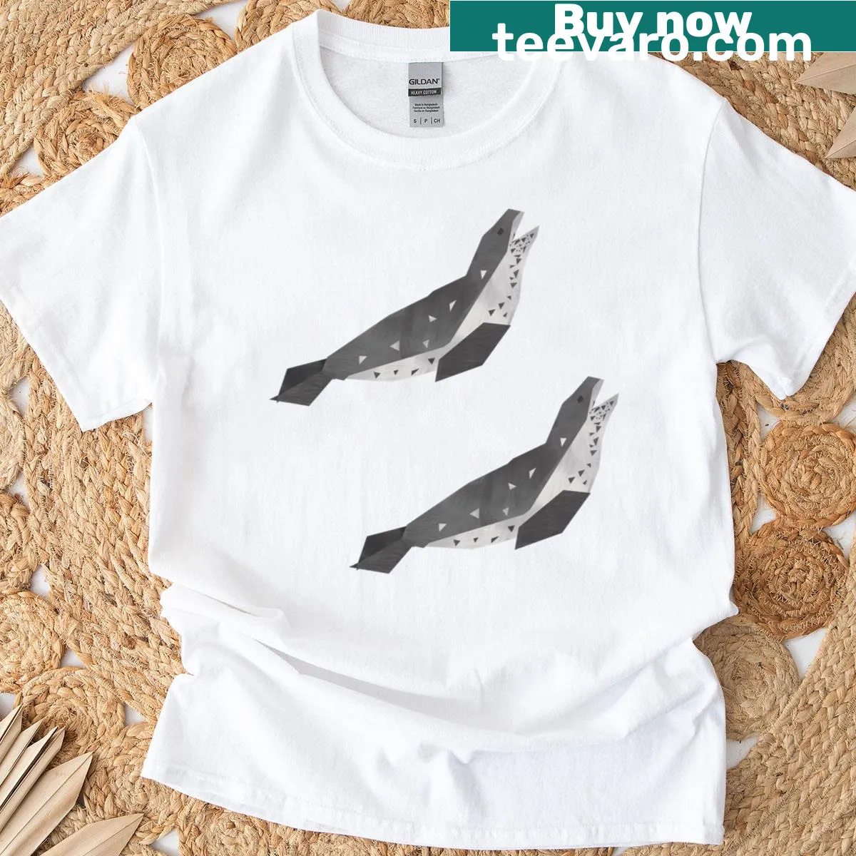T-shirt featuring illustrated pair of leopard seals — on a men's t-shirt