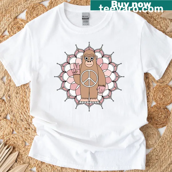 Illustrated peaceful Sasquatch with mandala graphic on t-shirt