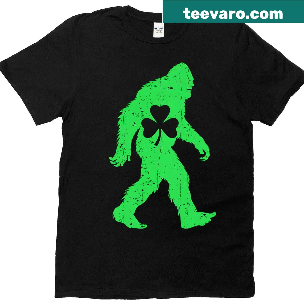 Bigfoot surrounded by shamrocks on St. Patrick's Day t-shirt — on a men's t-shirt